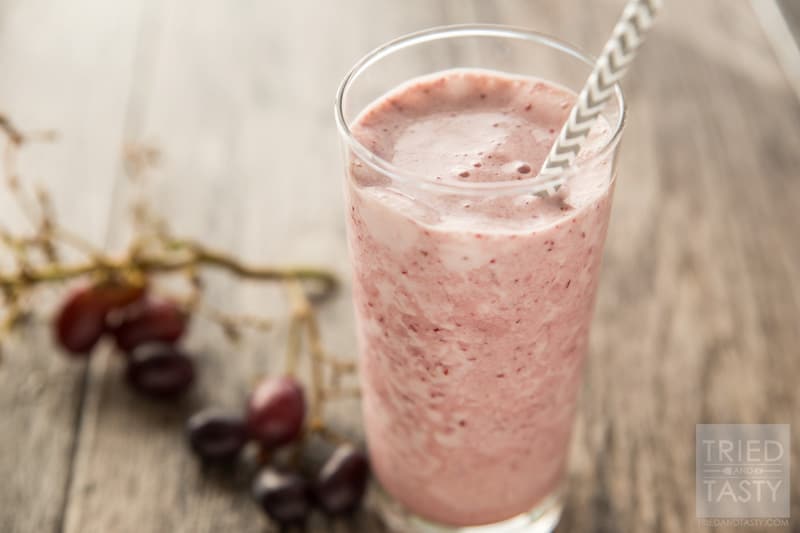 Simple Grape Smoothie // Ever had a grape smoothie before? The next time you buy red grapes - keep this in mind. It's the perfect balance of sweet & tart and has just a few ingredients. Spina quick cycle in your blender and you'll have a great way to start your day or pick-me-up when you need it! | Tried and Tasty