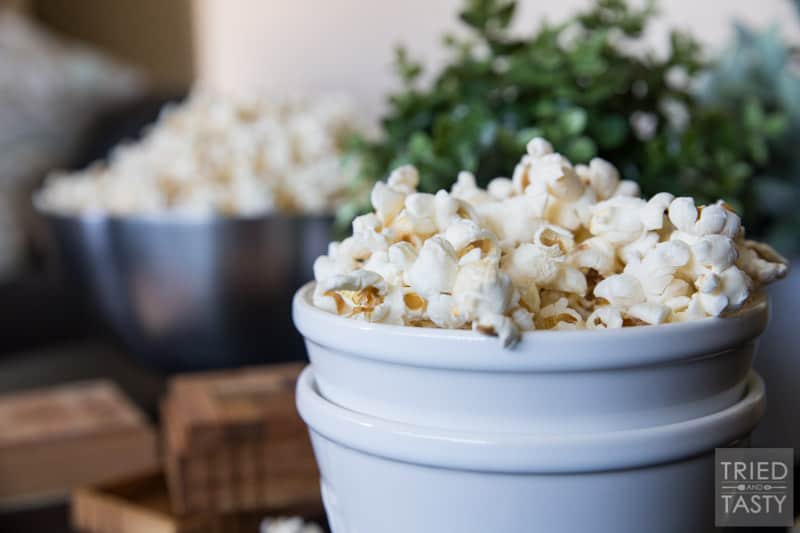 Honey Butter Popcorn // The kids will flip over this delicious popcorn recipe! You only need five ingredients - and I can almost guarantee you have everything on hand already. Plus, there's no microwave involved - say goodbye to yucky chemicals! | Tried and Tasty