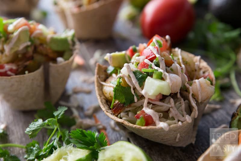 Shrimp Taco Cups // Made with Flatour MuliGrain with Flax Flatbread, these Shrimp Taco Cups are a unique way to throw a Mexican Fiest dinner party. Packed with flavor in the knockout combo of marinated grilled shrimp AND topped with a zesty shrimp ceviche! | Tried and Tasty