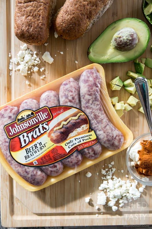 Southwestern Bratwursts // Want a zesty new fun twist on a traditional grilled brat? These Southwestern Bratwursts have the kick of a chipotle mayo but the smooth creamy addition of fresh avocado and sprinkled with a bit of cheese to balance it all. Perfect for your grilling all summer long! | Tried and Tasty