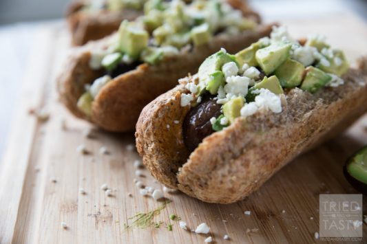 Southwestern Bratwursts // Want a zesty new fun twist on a traditional grilled brat? These Southwestern Bratwursts have the kick of a chipotle mayo but the smooth creamy addition of fresh avocado and sprinkled with a bit of cheese to balance it all. Perfect for your grilling all summer long! | Tried and Tasty