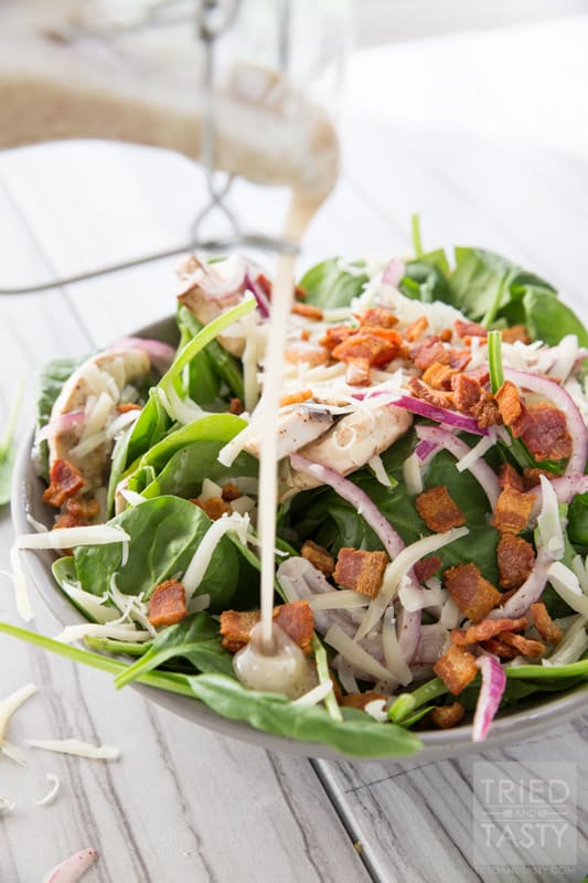 Spinach Salad // You wiill fall in love at first taste with this salad. A delicious combination of so many wonerful flavors. Great addition to any dinner table spread. Great for BBQ's, picnics, potlucks, or holiday parties. Simple to put together! | Tried and Tasty