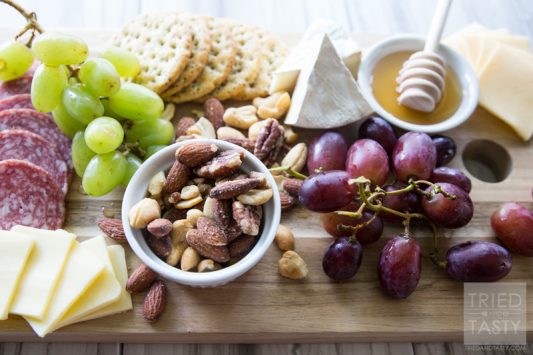 How To Build The Perfect Cheese Board // If you want a show stopper at the beginning of your dinner party, you do not want to miss this excellent how-to. What components do you need? Why do you need them? Your guests will love this perfect combo! | Tried and Tasty