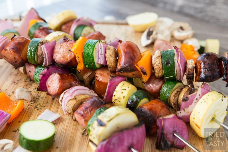 Grilled Sausage & Veggie Kabobs // When temps are rising it's time to take dinner outside. These kabobs are absolutely perfect and completely customizable. Swap in your fav veggies, skewer up your favorite sausage and voila you've got a delicious dinner in only a matter of minutes! | Tried and Tasty