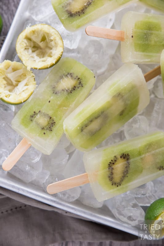 Kiwi Limeade Popsicles // You will fall in love with this cool treat at first lick. Perfectly sweet (without any refined sugar) and wonderfully refreshing. A great addition to your summertime dessert menu! | Tried and Tasty