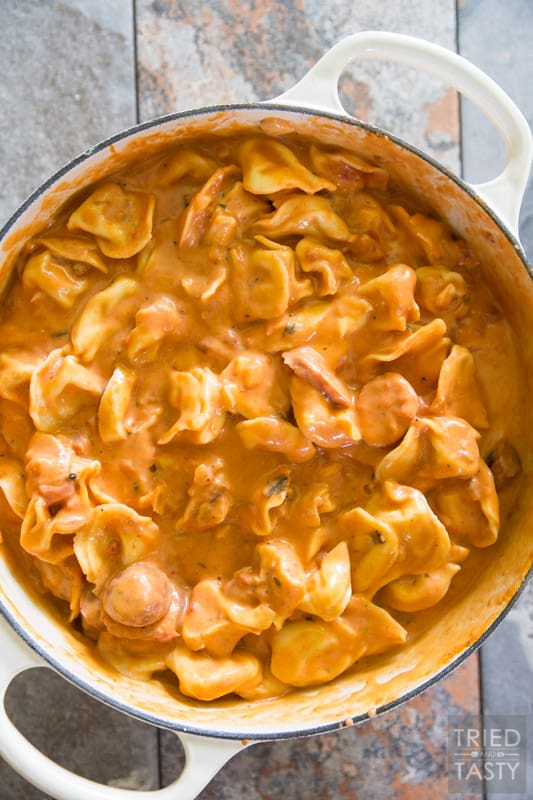 Two-Timin' Tortellini and Sausage // This simple one pot meal is perfect any night of the week. Ready in 30 minutes, tasty enough for the whole family, and with the addition of sausage it's a hearty filling dinner you'll love! | Tried and Tasty