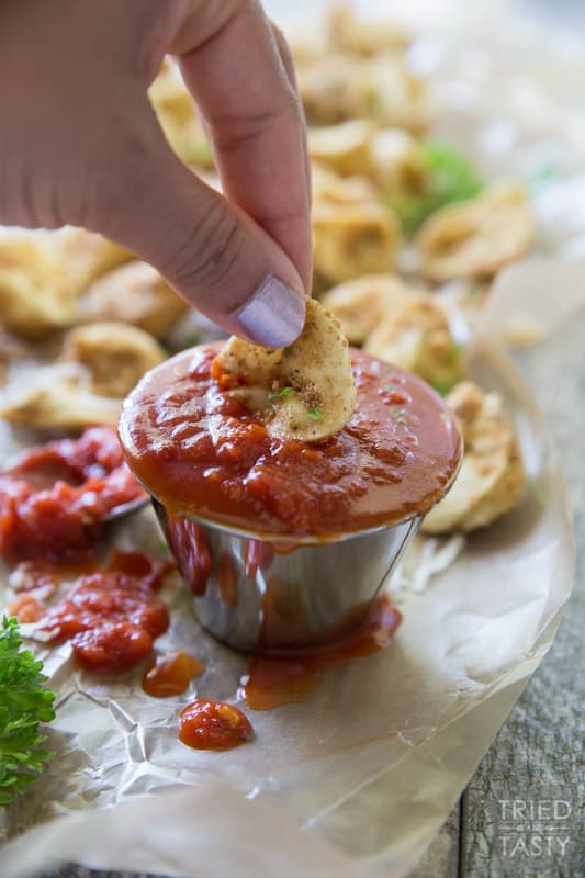 Baked Italian Tortellini // These little morsels of deliciousness are perfect dunked in marinara. A great appetizer before your favorite Italian meal that everyone will fall in love with at first bite! | Tried and Tasty