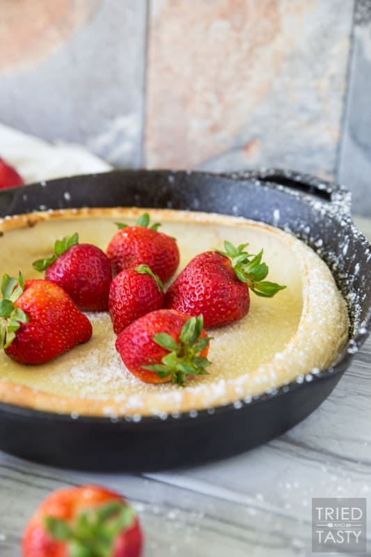 Chocolate Covered Strawberry Dutch Baby Pancakes // You've had a german pancake (or Dutch Baby as they are also called) but have you had this delightful chocolate covered strawberry version? Probably not... but I'm here to change that. This would be the most excellent breakfast to wake up to! | Tried and Tasty