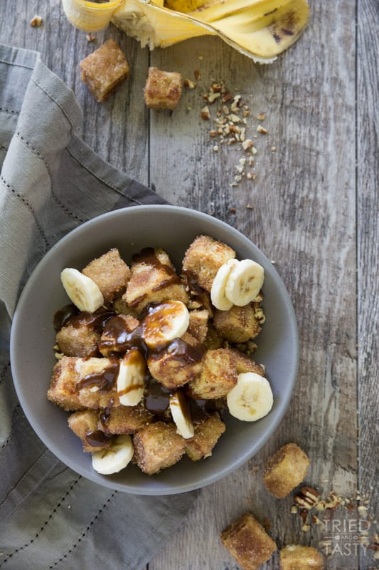 Pumpkin Spice Bananas Foster French Toast Bites // French toast is taken next level with these adorably delicious bites of heaven. You won't believe how wonderfully the flavors come together in this amazing fall inspired breakfast (that can be enjoyed all year long). The best bananas foster breakfast dessert around! | Tried and Tasty