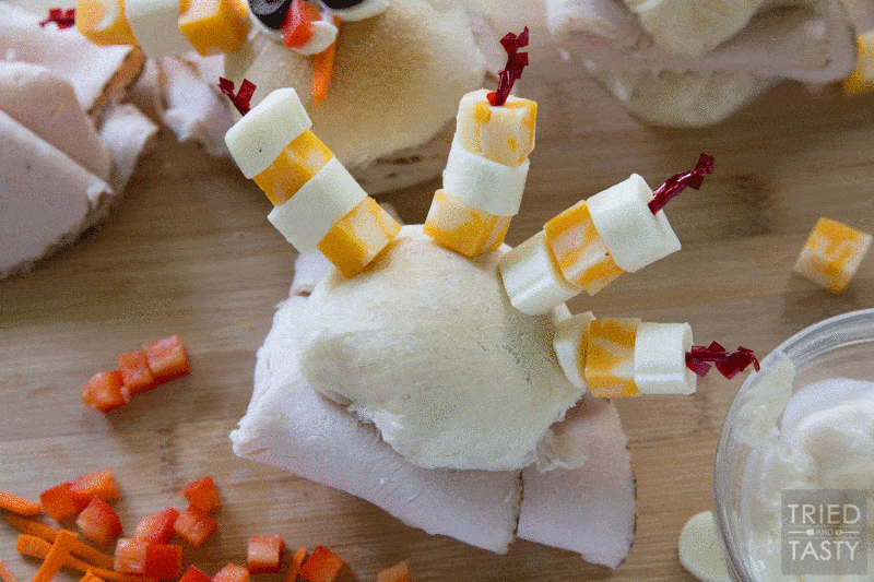 Turkey and Cheese Sammies // These adorable sandwiches will be the talk of the lunchroom. Get kids into the kitchen to make their tasty turkey sandwiches that everyone will want a bite of! | Tried and Tasty