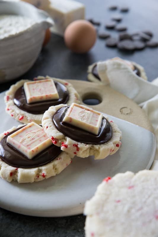 Chocolate Peppermint Bark Sugar Cookies // This unique twist on 'peppermint bark' will have you swooning. Chocolate ganache meets the most delicious peppermint sugar cookie! The ultimate holiday cookie (perfect for a cookie exchange)! | Tried and Tasty