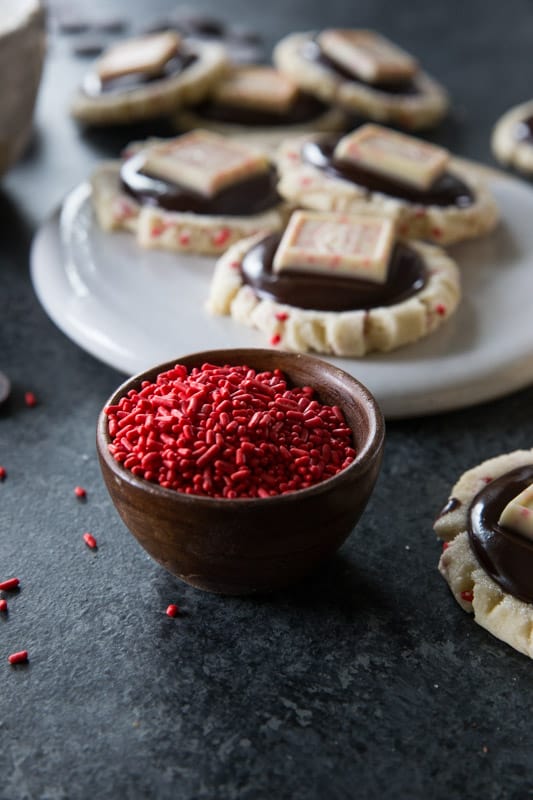 Chocolate Peppermint Bark Sugar Cookies // This unique twist on 'peppermint bark' will have you swooning. Chocolate ganache meets the most delicious peppermint sugar cookie! The ultimate holiday cookie (perfect for a cookie exchange)! | Tried and Tasty