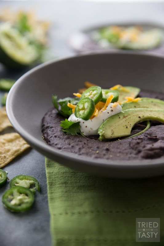 20 Minute Black Bean Soup // This quick and easy meal is absolutely delightful! Black beans are known to support heart health with their fiber, potassium, folate, vitamin B6, phytonutrient content and lack of cholesterol. This soup is an excellent heart healthy meal! | Tried and Tasty