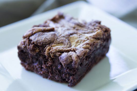 Bestie Swirl Brownies // A homemade 'from scratch' brownie recipe is elevated with the most delicious nut butter. Sink your teeth into these for a tasty treat. If you want even more of a decadent dessert, make it a la mode! | Tried and Tasty