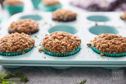 Carrot Oat Muffins With A Sweet Crunchy Streusel // DOesn't get any easier than this muffin. Great for breakfast or snack. Made with whole wheat, oats, and a list of healthy refined sugar-free ingredients. The sweet and crunchy streusel is the 'icing on the cake'. | Tried and Tasty