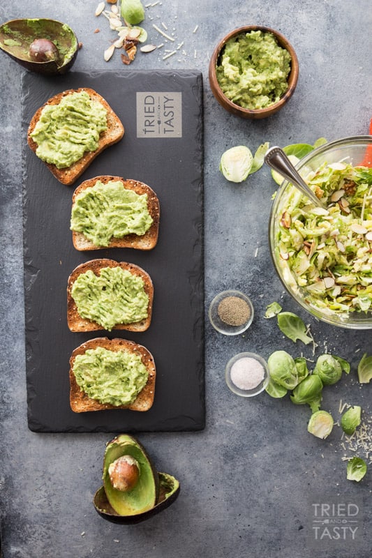 Cheesy Brussels Sprouts and Avocado Toast // Avocado toast is all the rage. However. You haven't had THIS avocado toast before! This will change your life. Even if you don't like avocados you will LOVE this delicious combination. This recipe has everything you want in an avo toast: a little bit of crunch, a little bit of cheese, some veggies and a whole lot of flavor. | Tried and Tasty