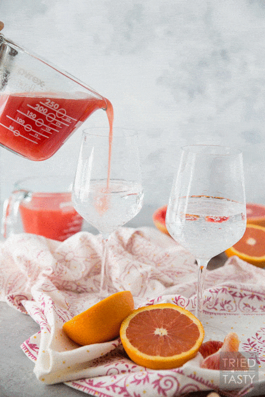 Triple Citrus Virgin Mimosa // If you're looking for a morning cocktail that's family friendly you've come to the right place. Adults and kids alike will love this - and as a bonus there's no refined sugar added! This mimosa is 100% natural! | Tried and Tasty