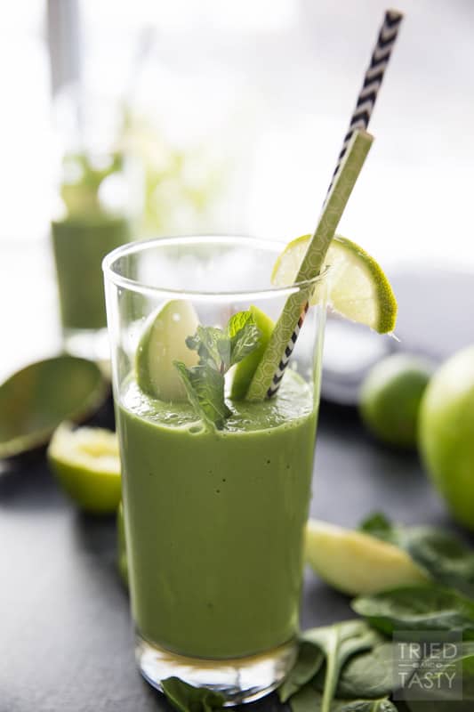 Pistachio Green Smoothie // Chances are you haven't had a green smoothie like this before. The key to this energizing boost is pistachios! Blended together with several other green favorites for a deliciously smooth drink. A nice change of pace yet tasty staple for your morning routine! | Tried and Tasty
