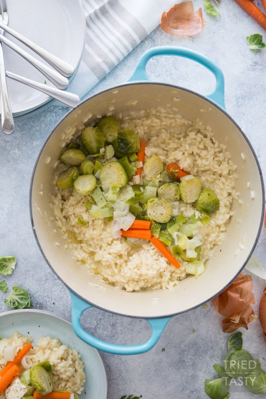 Risotto with Parmigiano Reggiano and Steamed Winter Veggies // This comforting meal is perfect for the cold winter months. Plus made with seasonal veggies that pair perfectly with one another! Warm, cheesy, and filling. All that you could ask for in a delicious dinner! | Tried and Tasty