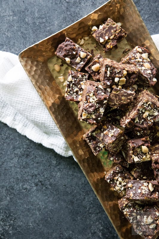 Salted Dark Chocolate No Bake Crunch Bars // Stop the presses! These no-bake treats have an amazing ingredient lineup and will be irresistible by any chocolate lovers who try them! Prep time is less than 15 minutes, then all you have to do is chill. It's just that easy! | Tried and Tasty