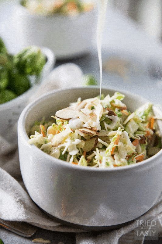 Coleslaw with Shaved Brussels Sprouts and Almonds // This crunchy, tangy coleslaw is taken to the next level with shaved brussels sprouts and sliced almonds - Healthy never tasted so good! | Tried and Tasty.