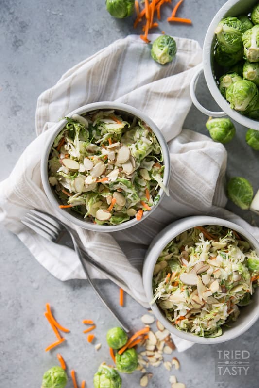 Coleslaw with Shaved Brussels Sprouts and Almonds // This crunchy, tangy coleslaw is taken to the next level with shaved brussels sprouts and sliced almonds - Healthy never tasted so good! | Tried and Tasty.