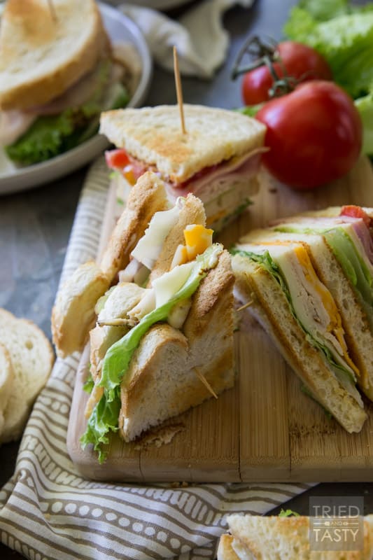 Triple Decker Deli Sandwich // This is the sandwich of all sandwiches that you WILL want to have all summer long! Lunch won't be the same again with this delicious triple decker threat! You'll want to stop by to see the secret ingredient |Tried and Tasty