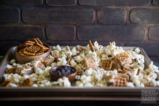 Crispy Pumpkin Spice Snack Mix | This amazing mix is infused with the flavors of Fall, including pumpkin and cinnamon. Say goodbye to plain old popcorn, and hello to the sweet and salty flavors of this delectable mix! | Tried and Tasty