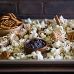 Crispy Pumpkin Spice Snack Mix | This amazing mix is infused with the flavors of Fall, including pumpkin and cinnamon. Say goodbye to plain old popcorn, and hello to the sweet and salty flavors of this delectable mix! | Tried and Tasty