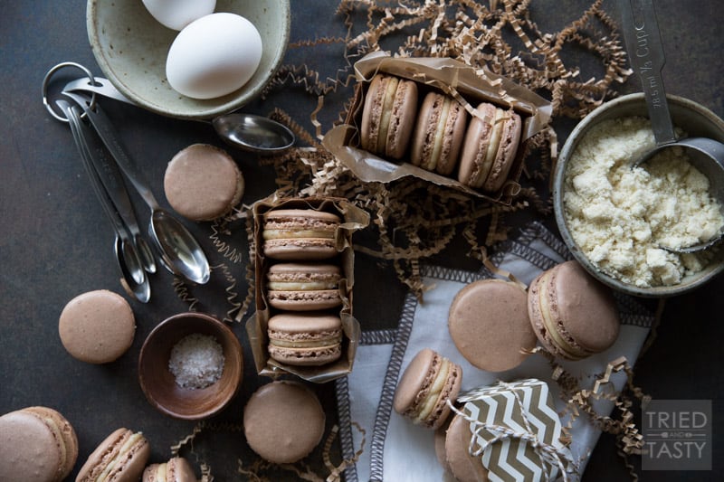 Dark Chocolate Salted Caramel French Macarons | These French Macaron’s are as tasty as they are beautiful! Dark Chocolate and Caramel are perfectly fused together between two crispy, airy layers of perfection. | Tried and Tasty