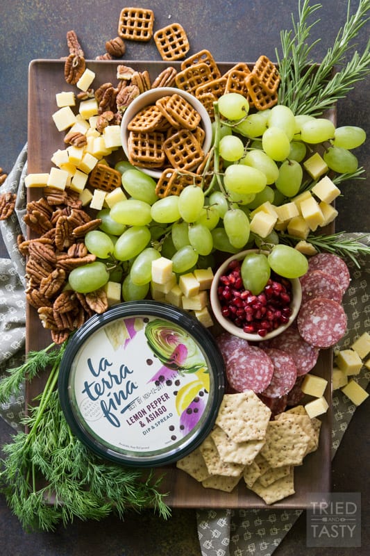 Lemon Pepper Asiago Holiday Cheese Board | Make your holiday spread a little more festive with this holiday cheese board. There's something for everyone! | Tried and Tasty