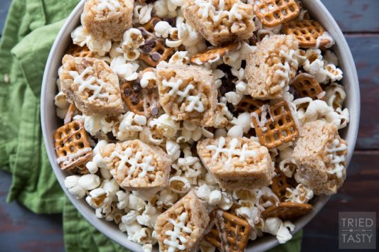 Football Snack Mix // This amazing football mix is perfect for your Super Bowl party. Say goodbye to plain old popcorn, and hello to the sweet and salty flavors of this delectable mix! | Tried and Tasty