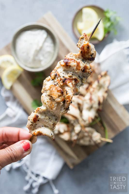 Grilled Lemon Pepper Chicken Skewers // Tender, juicy & flavorful. That's the triple threat power punch you'll get with these delicious grilled chicken skewers. Perfect any time of the year! | Tried and Tasty